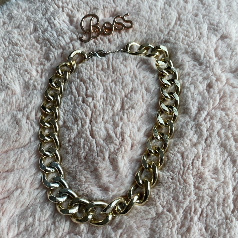 Boss ring and chain necklace